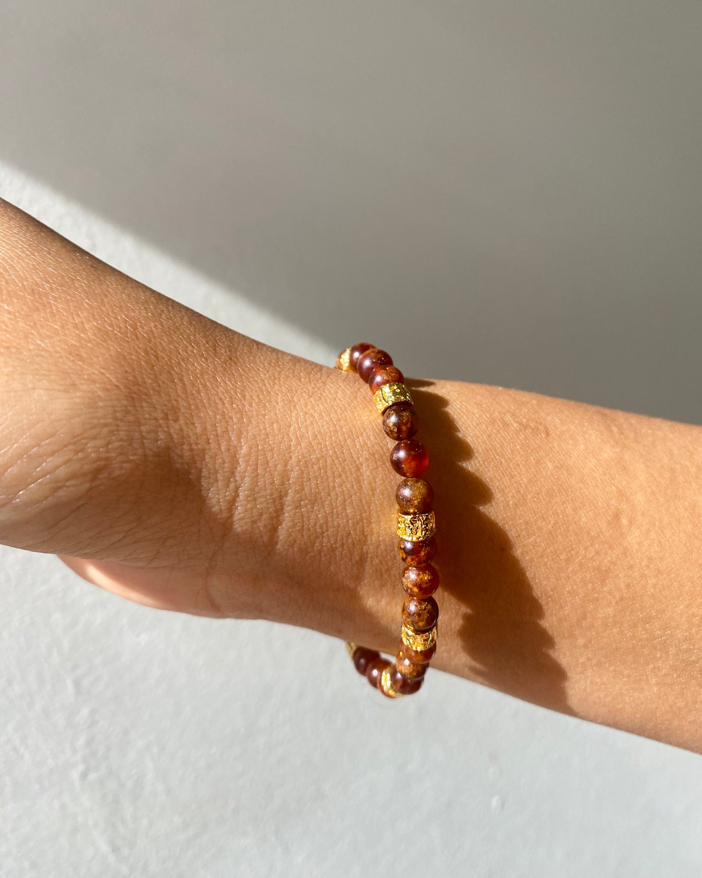Brown and gold beaded bracelet